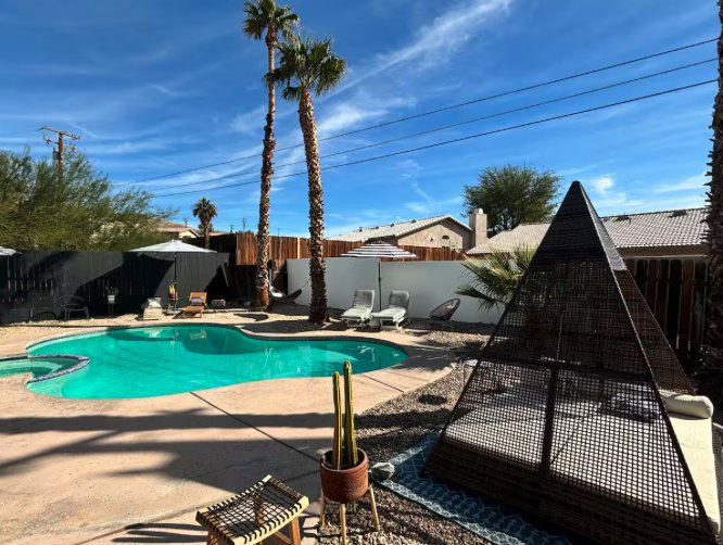 After: covered patio with updated seating and decor