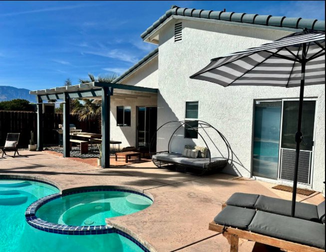 After: pool and patio refreshed with pergola and seating
